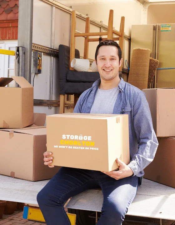 Customer with a Storage Chorlton branded box at a removal van